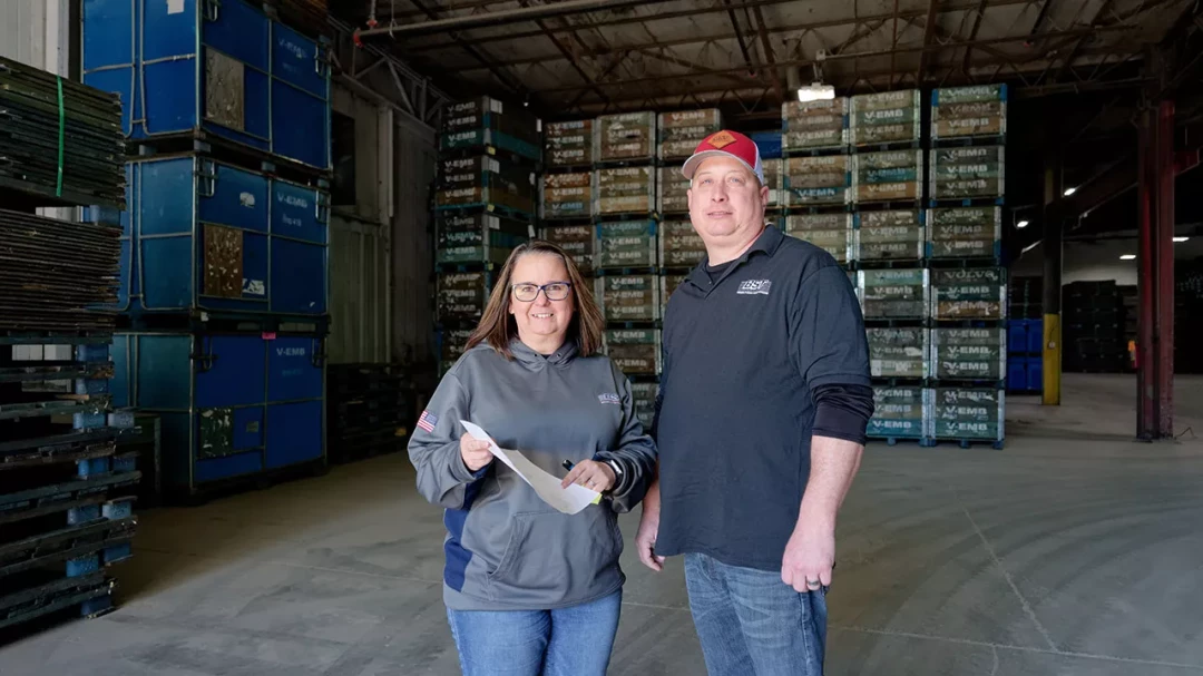 BST warehouse team members standing inside distribution facility
